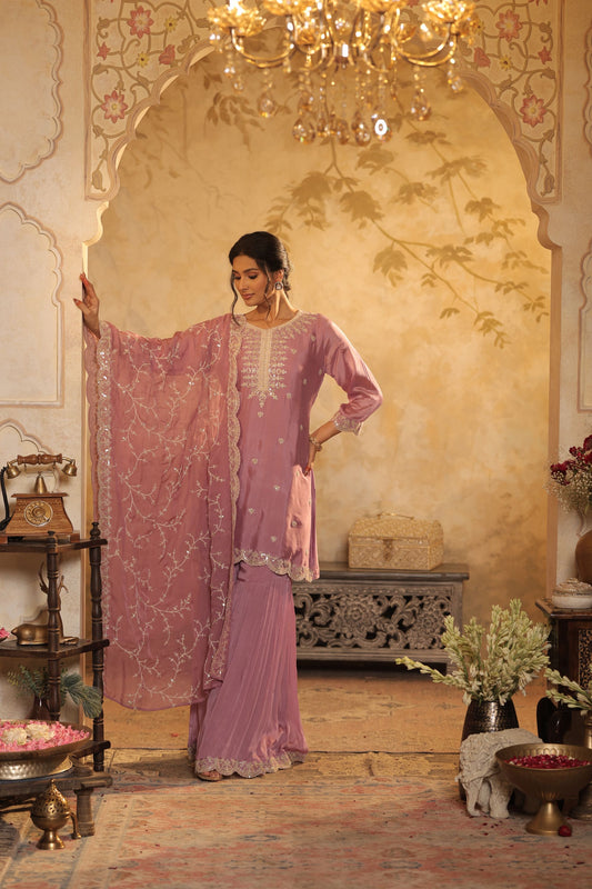 Pastel Mauve Suit Features Delicate Thread And Zari Embroidery With Lace Detailing With Shimmer