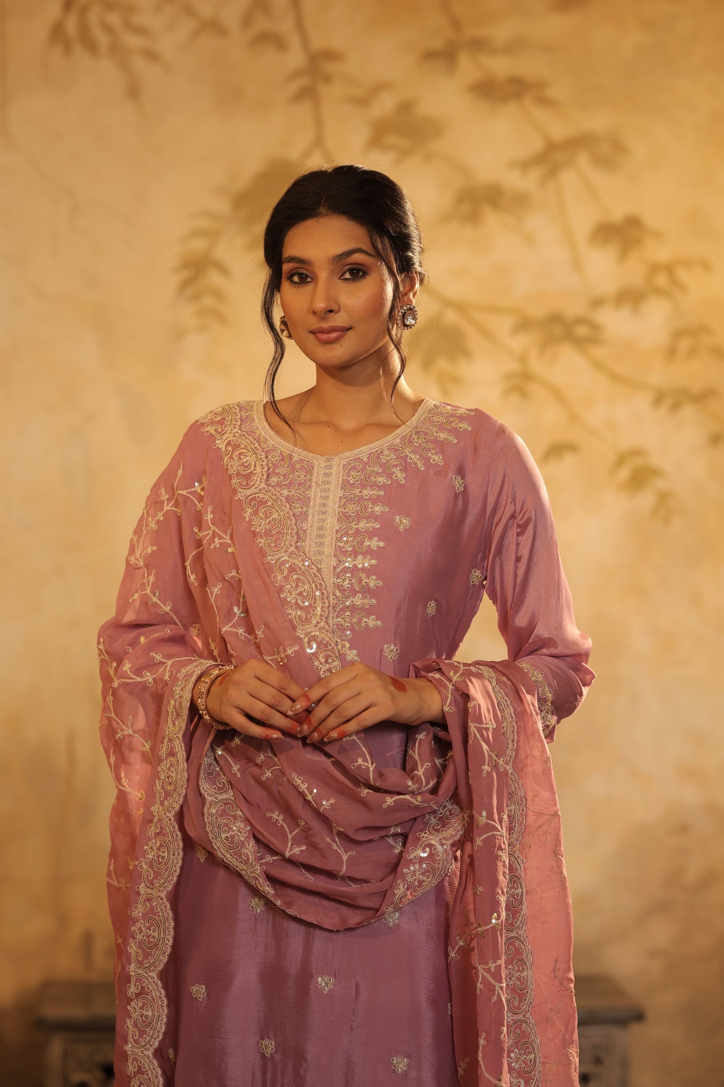 Pastel Mauve Suit Features Delicate Thread And Zari Embroidery With Lace Detailing With Shimmer