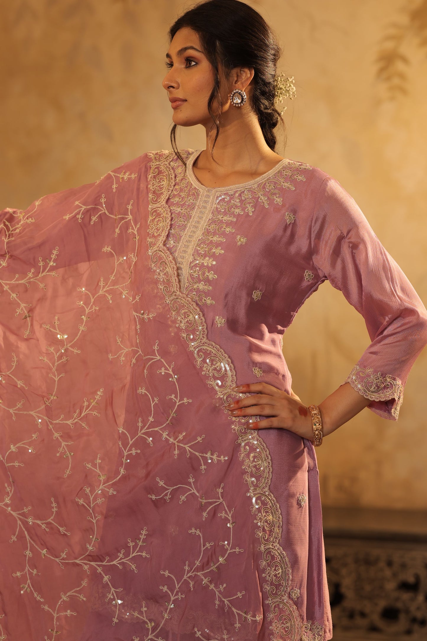 Pastel Mauve Suit Features Delicate Thread And Zari Embroidery With Lace Detailing With Shimmer